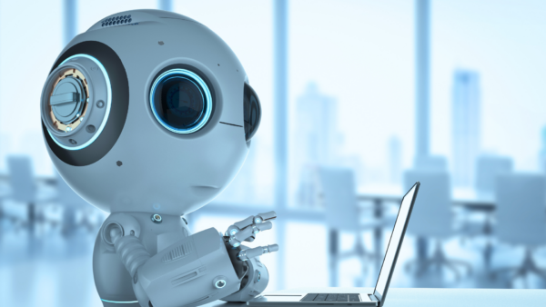 Modern AI tool robot working on a computer