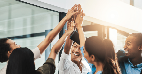 A team giving each other high-fives