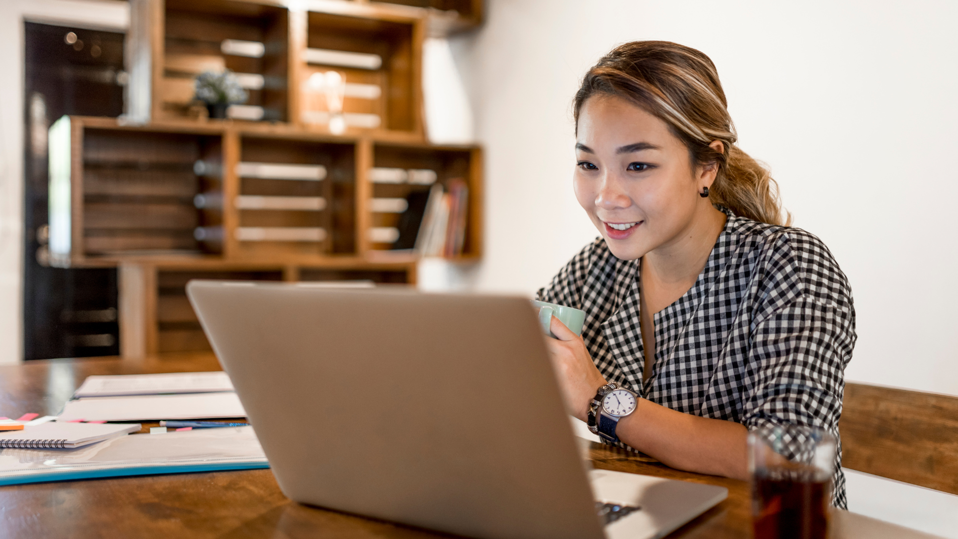IT professional implementing cybersecurity controls on laptop during winter security audit