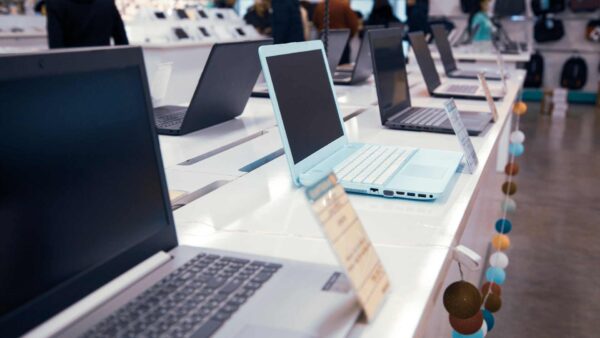 Laptops in a store representing the second stage of ITAM, Acquisition.
